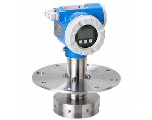 Industrial pressure transmitter with a blue housing and round front display, mounted on a stainless steel flange for process measurements.