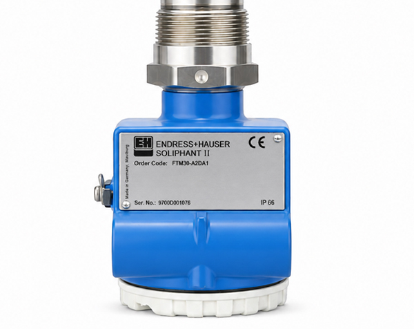 FTM-30-B4AA1 — DERAAK Blue Endress+Hauser Soliphant II valve actuator with silver sensor housing and white base, shown against a white background.