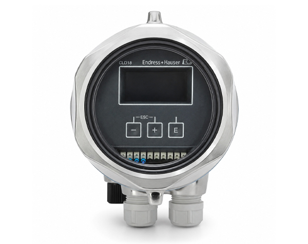 Endress+Hauser CLD18 circular digital flow transmitter with a black display and terminal block at the bottom.