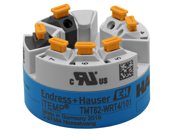 TMT82-ENDRESSHAUSER — DERAAK Circular multi-terminal connector with orange top clamps on a blue base; Endress+Hauser iTEMP TMT82-WRT4/101 (Made in Germany 2019).