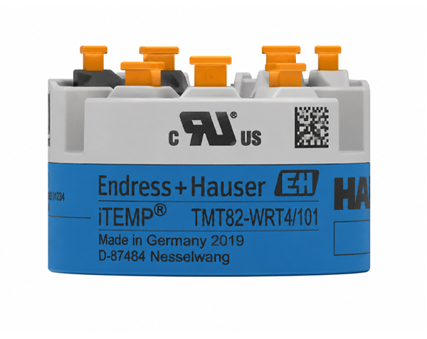 TMT82 — DERAAK Endress+Hauser iTEMP temperature transmitter module with orange terminal connectors and blue label reading Made in Germany 2019 D-87484 Nessellwang.