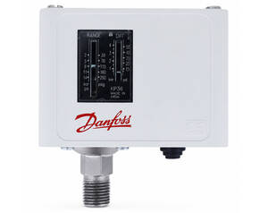 Danfoss KP36 pressure regulator box with gauge on front and metal threaded inlet/output connectors below, white enclosure with red Danfoss logo.