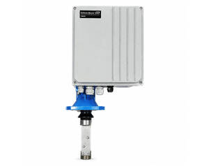 Industrial transmitter with a gray enclosure mounted to a blue flange and a vertical metal probe.