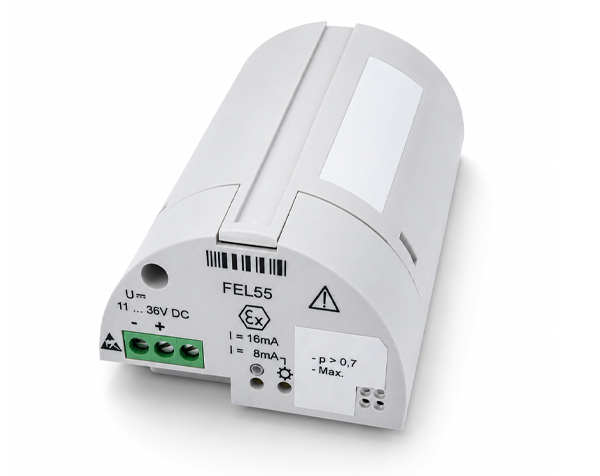 fel55-endress — DERAAK White FEL55 control module with green screw-terminal block on the front edge and warning labels.