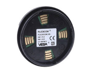 نمای پشت نمایشگر PLICSCOM.XB وگا دارای برچسب مشخصات فنی، شماره سریال و پین‌های اتصال مسی