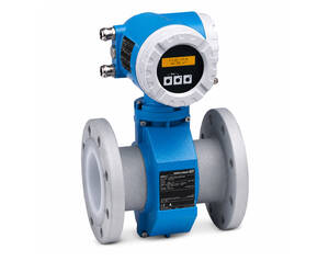 Industrial flow meter with blue body and round digital display, flanged connections on both ends.