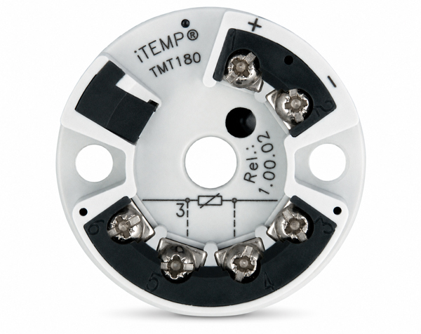 large-endress-und-hauser-tmt-180-a213-aba-0-bis-100-c — DERAAK Circular white mounting base with multiple screw terminals around the edge.