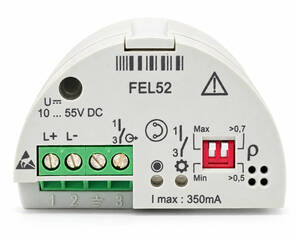 Front of FEL52 electrical module with a green L+/L- terminal block, a red dual-switch, warning symbol, barcode, and I max 350mA label.