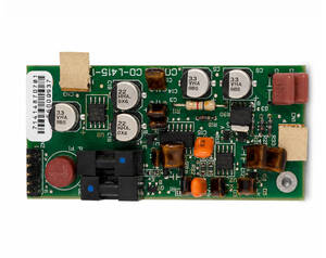 Small green printed circuit board populated with capacitors, resistors, inductors, and connectors.
